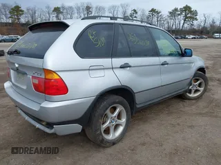 2001 BMW X5 3.0i with VIN WBAFA53571LM67411, listed as a IAAI auction lot 41727600 with 999,999 mi miles. Bid and sale history available at carsss.com. Image 4.