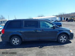 2013 Dodge Grand Caravan SXT with VIN 2C4RDGCG3DR624092, listed as a IAAI auction lot 41860395 with 164,539 mi miles. Bid and sale history available at carsss.com. Image 12.