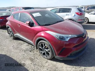 2018 Toyota C-HR XLE with VIN NMTKHMBX3JR059057, listed as a IAAI auction lot 41810801 with 124,246 mi miles. Bid and sale history available at carsss.com. Image 1.