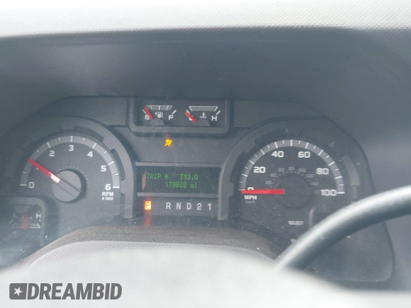 2013 Ford Econoline Cargo Commercial with VIN 1FTNE2EL1DDB27599, listed as a IAAI auction lot 41878865 with 179,802 mi miles and . Bid and sale history available at DreamBid. Image 7.