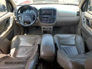 2002 Ford Escape XLT Choice with VIN 1FMYU04132KD84336, listed as a Copart auction lot 66705025 with 198,979 mi miles and Salvage title. Bid and sale history available at DreamBid. Image 8.