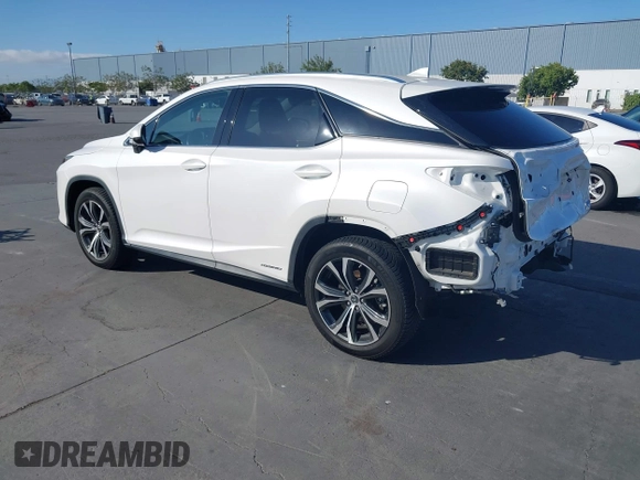 2021 Lexus RX 450h with VIN 2T2HGMDA2MC071281, listed as a IAAI auction lot 42587770 with 88,009 mi miles and . Bid and sale history available at DreamBid. Image 3.