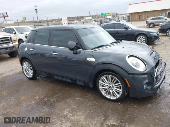 2017 MINI Hardtop 4 Door Cooper S z VIN WMWXU3C3XH2F49201, wystawiony jako IAAI lot #41837027 z przebiegiem 75 949 mil mil oraz . Historia ofert i sprzedaży dostępna na DreamBid. Obrazek 14.