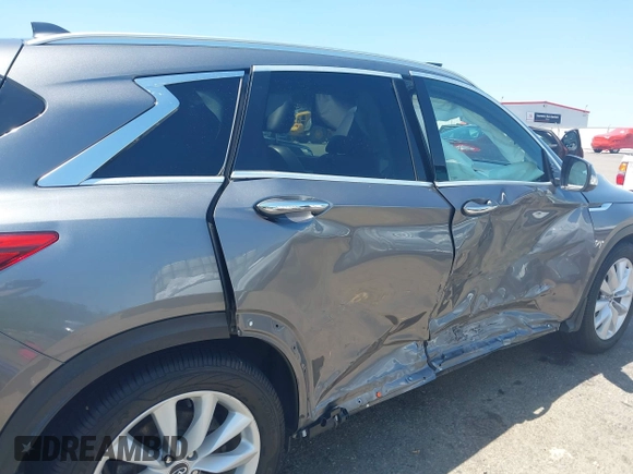 2019 Infiniti QX50 Luxe with VIN 3PCAJ5M31KF113513, listed as a IAAI auction lot 41971746 with 68,897 mi miles and . Bid and sale history available at DreamBid. Image 17.