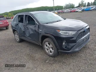 2020 Toyota RAV4 Hybrid XLE with VIN 2T3RWRFV3LW064403, listed as a IAAI auction lot 42297370 with 102,730 mi miles and . Bid and sale history available at DreamBid. Image 1.