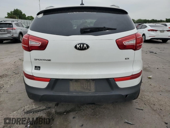 2013 Kia Sportage EX with VIN KNDPCCA29D7539463, listed as a Copart auction lot 58605095 with 143,533 mi miles and Salvage title. Bid and sale history available at DreamBid. Image 6.