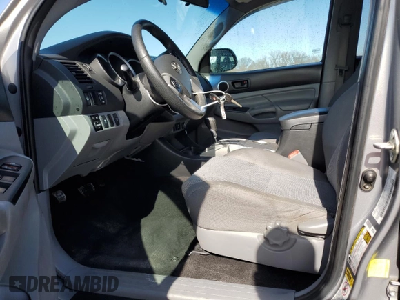 2014 Toyota Tacoma with VIN 3TMLU4EN4EM156401, listed as a Copart auction lot 46001045 with 124,289 mi miles and Salvage Title. Bid and sale history available at carsss.com. Image 7.