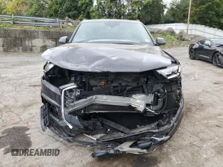 2021 Audi Q7 Premium with VIN WA1AJAF7XMD026559, listed as a Copart auction lot 74048224 with 59,648 mi miles and Salvage title. Bid and sale history available at DreamBid. Image 5.