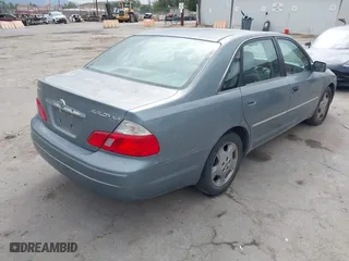 2003 Toyota Avalon XL with VIN 4T1BF28B83U318529, listed as a IAAI auction lot 42058121 with 171,889 mi miles. Bid and sale history available at carsss.com. Image 4.