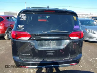 2018 Chrysler Pacifica Touring L with VIN 2C4RC1BGXJR157184, listed as a IAAI auction lot 41803388 with 102,095 mi miles and . Bid and sale history available at DreamBid. Image 16.