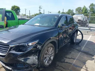 2021 Mazda CX-9 Carbon Edition with VIN JM3TCBDY3M0524241, listed as a IAAI auction lot 42538127 with 50,533 mi miles and . Bid and sale history available at DreamBid. Image 6.