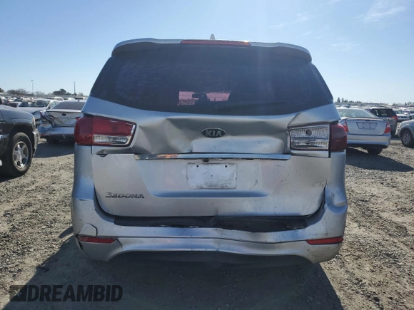 2017 Kia Sedona L with VIN KNDMA5C11H6273442, listed as a Copart auction lot 88358015 with 129,700 mi miles and Salvage Title. Bid and sale history available at DreamBid. Image 6.