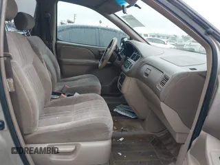 2001 Toyota Sienna CE with VIN 4T3ZF19C51U329489, listed as a IAAI auction lot 41535721 with 218,839 mi miles. Bid and sale history available at carsss.com. Image 5.