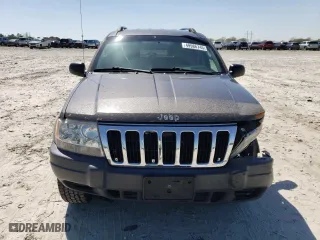 2003 Jeep Grand Cherokee Laredo with VIN 1J4GW48SX3C589100, listed as a Copart auction lot 49986745 with 247,687 mi miles and Salvage Title. Bid and sale history available at carsss.com. Image 5.