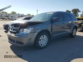 2013 Dodge Journey SE with VIN 3C4PDCAB4DT710144, listed as a Copart auction lot 65027115 with 130,771 mi miles and Salvage title. Bid and sale history available at DreamBid. Image 1.