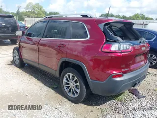 2020 Jeep Cherokee Altitude with VIN 1C4PJLLB3LD586099, listed as a IAAI auction lot 42706250 with 84,848 mi miles and . Bid and sale history available at DreamBid. Image 3.