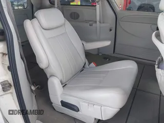 2007 Chrysler Town & Country Touring z VIN 2A4GP54L47R274792, wystawiony jako IAAI lot #42523960 z przebiegiem 69 081 mil mil oraz . Historia ofert i sprzedaży dostępna na DreamBid. Obrazek 8.