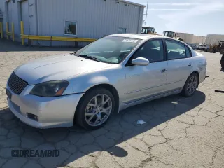 2006 Nissan Altima SE with VIN 1N4BL11D56C242044, listed as a Copart auction lot 52616165 with 182,548 mi miles and Salvage title. Bid and sale history available at DreamBid. Image 1.
