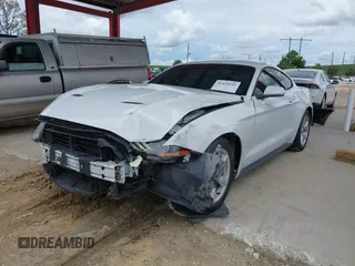 2018 Ford Mustang EcoBoost with VIN 1FA6P8TH4J5165145, listed as a IAAI auction lot 42414241 with 58,884 mi miles and . Bid and sale history available at DreamBid. Image 18.