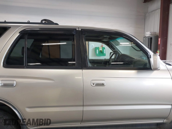 1999 Toyota 4Runner SR5 z VIN JT3HN86R8X0221532, wystawiony jako IAAI lot #41902556 z przebiegiem 406 602 mil mil oraz . Historia ofert i sprzedaży dostępna na DreamBid. Obrazek 14.