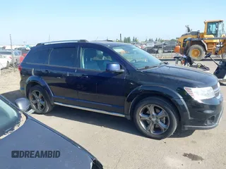2017 Dodge Journey Crossroad Plus z VIN 3C4PDCGG1HT577447, wystawiony jako IAAI lot #42408741 z przebiegiem 157 569 mil mil oraz . Historia ofert i sprzedaży dostępna na DreamBid. Obrazek 13.