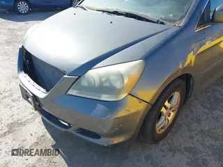 2007 Honda Odyssey EX-L z VIN 5FNRL38647B443269, wystawiony jako IAAI lot #42316300 z przebiegiem 121 616 mil mil oraz . Historia ofert i sprzedaży dostępna na DreamBid. Obrazek 6.