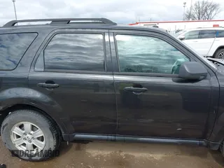 2011 Mercury Mariner with VIN 4M2CN8B7XBKJ01717, listed as a IAAI auction lot 42030587 with 115,766 mi miles and . Bid and sale history available at DreamBid. Image 13.