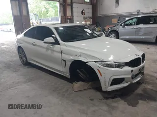2014 BMW 4 Series 435i xDrive z VIN WBA3R5C54EK186187, wystawiony jako IAAI lot #42248064 z przebiegiem 73 532 mil mil oraz . Historia ofert i sprzedaży dostępna na DreamBid. Obrazek 1.