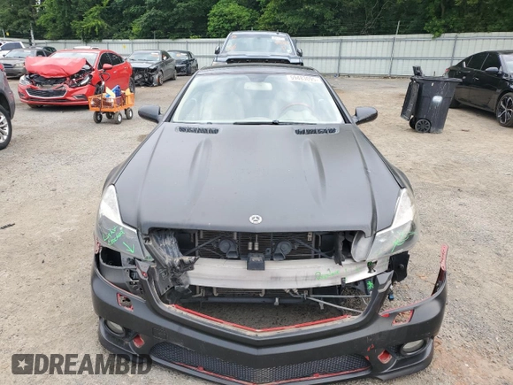 2009 Mercedes-Benz SL 550 с VIN WDBSK71F39F155827, выставлен на аукционе Copart как лот 59483095 с пробегом 74 017 миль миль и Списание • Salvage title. История ставок и продаж доступна на DreamBid. Изображение 5.