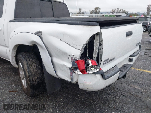 2009 Toyota Tacoma PreRunner with VIN 3TMJU62NX9M078106, listed as a IAAI auction lot 41768489 with 83,360 mi miles. Bid and sale history available at carsss.com. Image 19.