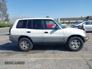 1999 Toyota RAV4 with VIN JT3GP10V2X7064915, listed as a IAAI auction lot 41998544 with 302,351 mi miles and . Bid and sale history available at DreamBid. Image 13.