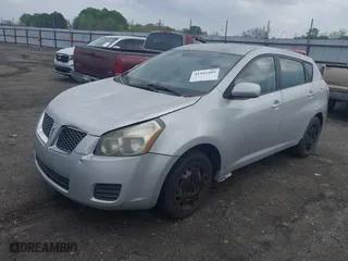 2009 Pontiac Vibe w/1SB with VIN 5Y2SP67039Z432930, listed as a IAAI auction lot 41951405 with 211,339 mi miles. Bid and sale history available at carsss.com. Image 2.