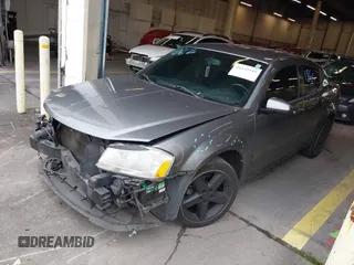 2011 Dodge Avenger Lux with VIN 1B3BD2FB5BN583464, listed as a IAAI auction lot 41135319 with 181,501 mi miles and . Bid and sale history available at DreamBid. Image 2.