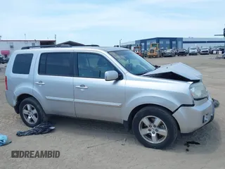 2011 Honda Pilot EX-L with VIN 5FNYF4H54BB099550, listed as a IAAI auction lot 42107327 with 217,050 mi miles and . Bid and sale history available at carsss.com. Image 13.