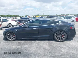 2017 Tesla Model S 100D with VIN 5YJSA1E47HF185734, listed as a IAAI auction lot 42076544 with 56,682 mi miles. Bid and sale history available at carsss.com. Image 13.