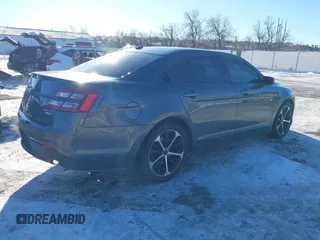 2015 Ford Taurus Limited with VIN 1FAHP2J85FG165823, listed as a IAAI auction lot 41315889 with 134,165 mi miles. Bid and sale history available at carsss.com. Image 4.