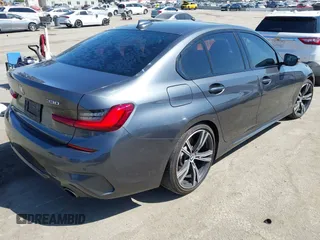 2019 BMW 3 Series 330i with VIN WBA5R1C55KAK11925, listed as a IAAI auction lot 41982248 with 62,711 mi miles and . Bid and sale history available at DreamBid. Image 4.