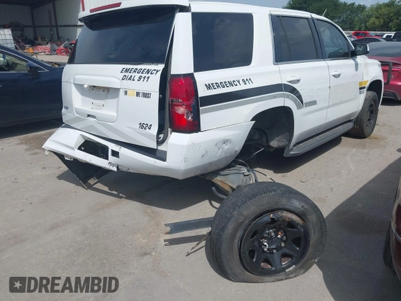 2016 Chevrolet Tahoe Commercial z VIN 1GNLCDEC9GR299693, wystawiony jako IAAI lot #42630221 z przebiegiem 127 081 mil mil oraz . Historia ofert i sprzedaży dostępna na DreamBid. Obrazek 21.