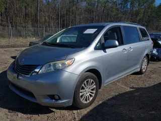 2011 Toyota Sienna XLE AAS with VIN 5TDYK3DC5BS039959, listed as a IAAI auction lot 41803881 with 129,479 mi miles. Bid and sale history available at carsss.com. Image 23.