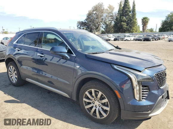 2019 Cadillac XT4 FWD Premium Luxury with VIN 1GYFZCR42KF104457, listed as a Copart auction lot 52783485 with 57,572 mi miles and Salvage title. Bid and sale history available at DreamBid. Image 4.