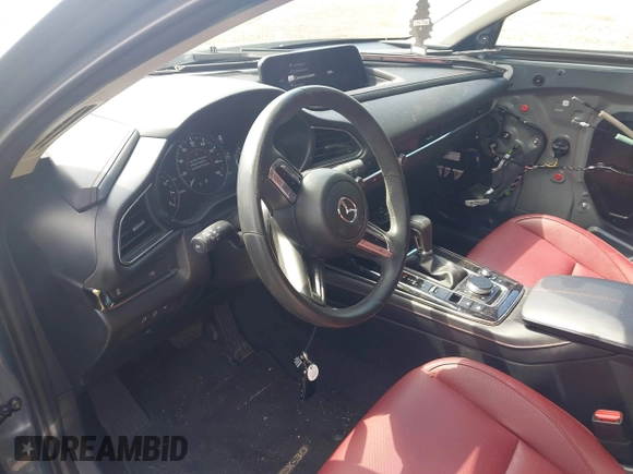 2023 Mazda CX-30 S Preferred z VIN 3MVDMBCM4PM558181, wystawiony jako IAAI lot #42589333 z przebiegiem 12 384 mil mil oraz . Historia ofert i sprzedaży dostępna na DreamBid. Obrazek 5.