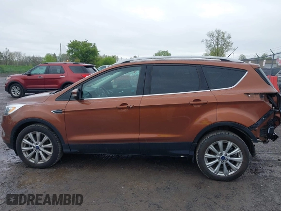 2017 Ford Escape Titanium with VIN 1FMCU0JD3HUB20846, listed as a IAAI auction lot 42182260 with 28,610 mi miles and . Bid and sale history available at DreamBid. Image 15.