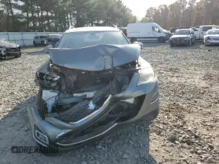 2011 Mazda CX-9 Grand Touring z VIN JM3TB2DV5B0323818, wystawiony jako Copart lot #78725104 z przebiegiem Nie podano mil oraz Szkoda całkowita • Salvage title. Historia ofert i sprzedaży dostępna na DreamBid. Obrazek 10.