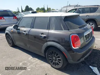 2015 MINI Hardtop 4 Door z VIN WMWXS5C55FT830653, wystawiony jako IAAI lot #42721174 z przebiegiem 126 298 mil mil oraz . Historia ofert i sprzedaży dostępna na DreamBid. Obrazek 3.