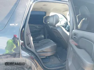 2014 GMC Yukon SLT with VIN 1GKS1CE00ER247249, listed as a IAAI auction lot 41271351 with 215,044 mi miles. Bid and sale history available at carsss.com. Image 8.