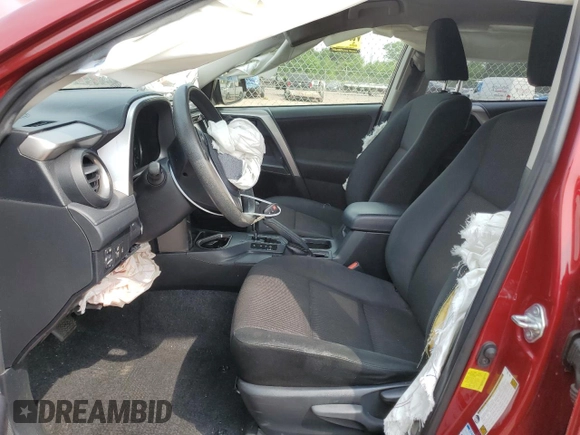 2018 Toyota RAV4 LE with VIN JTMBFREV2JD233808, listed as a Copart auction lot 59021235 with 71,430 mi miles and Salvage title. Bid and sale history available at DreamBid. Image 7.