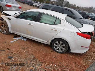 2015 Kia Optima LX with VIN KNAGM4A73F5646213, listed as a IAAI auction lot 41290553 with 101,415 mi miles. Bid and sale history available at carsss.com. Image 3.