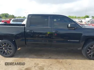 2015 Chevrolet Silverado 1500 LT with VIN 3GCPCREC3FG477250, listed as a IAAI auction lot 42150823 with 169,036 mi miles and . Bid and sale history available at DreamBid. Image 13.