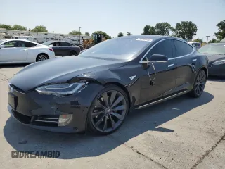 2016 Tesla Model S 90D with VIN 5YJSA1E29GF158774, listed as a Copart auction lot 60143405 with Not provided miles and Salvage title. Bid and sale history available at DreamBid. Image 1.