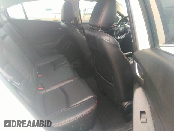 2015 Mazda 3 i Grand Touring z VIN JM1BM1W75F1232796, wystawiony jako IAAI lot #39976305 z przebiegiem 69 161 mil mil oraz . Historia ofert i sprzedaży dostępna na DreamBid. Obrazek 8.